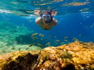 Free divers in the waters of Formentera. Apnea diving. Watersports