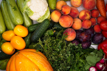 Huge group of raw ripe vegetables and fruit, top view. Harvest of vegetables. Season agrarian market