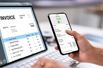 Accountant With Online Invoice On Hybrid Tablet