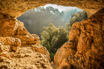 Landscape view from inside a cave with a peculiar shape