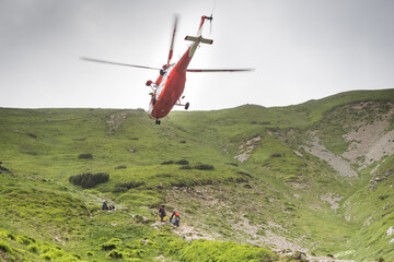 Fototapeta na wymiar Tatry, rescue operation using a helicopter