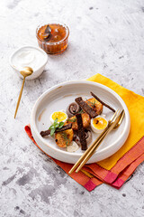 Breakfast with pickled herring, new potatoes, soft boiled egg