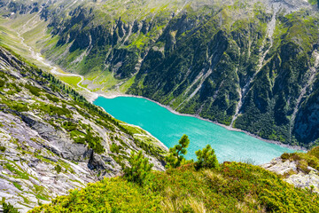 Naklejka na ściany i meble Beautiful alpine walley with azure blue water of Speicher Zillergrundl dam, Zillertal Alps, Austria