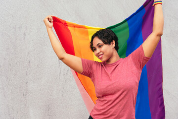 Woman with the LGTB flag.
