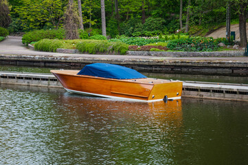 Covered wooden boat at the pier