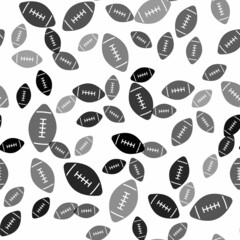 Black American football ball icon isolated seamless pattern on white background. Rugby ball icon. Team sport game symbol. Vector