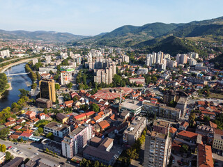 Fototapeta premium Aerial drone view of Zenica, Bosnia and Herzegovina. Buildings, streets, parks and residential houses. City center of Zenica, view from above. 