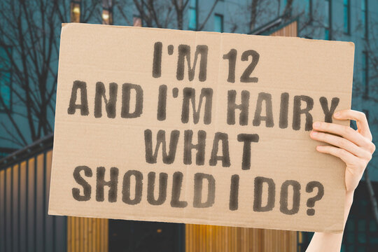 The question " I'm 12.and. I'm hairy. What should I do? " on a banner in men's hand with blurred background. Kids. Healthcare. Psychology. Puberty. Pubertation
