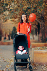 Mom Pushing Baby Stroller Holding a Red Balloon