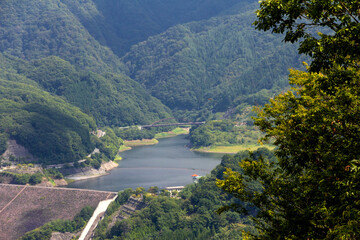 Fototapeta na wymiar Arial view of Arakawa dam near Sosenkyo town, Kofu, Yamanashi prefecture, Chubu, Japan.