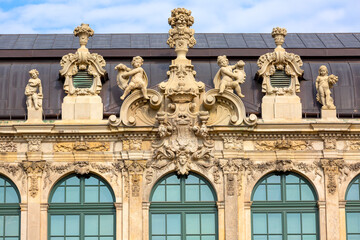 Fototapeta na wymiar 18th century baroque Zwinger Palace, ornamental facade of Mathematisch-Physikalischer Salon, Dresden, Germany