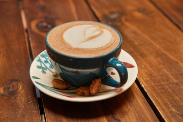 cup of cappuccino on the table