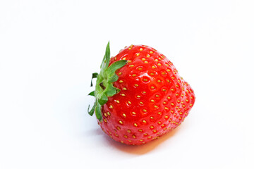 a juicy strawberry on white background