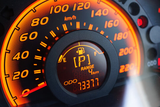 Empty fuel tank sign display on a modern digital car dashboard