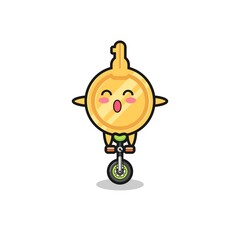 The cute key character is riding a circus bike