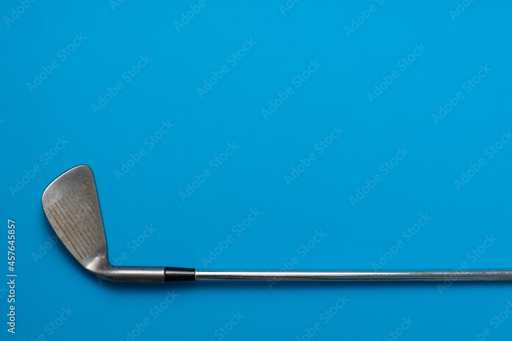 Wall mural golf club on blue background, sport concept