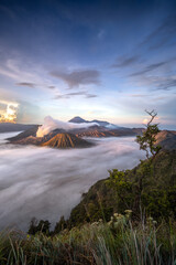 sunrise over the clouds in the mountain