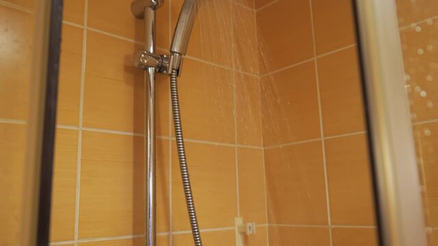 Shower Cabin. Water Droplets On A Fogged Shower Door