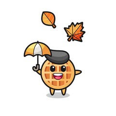 cartoon of the cute circle waffle holding an umbrella in autumn