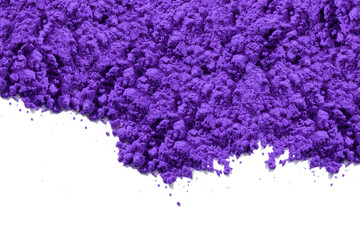 Purple pigment granules and powder strewn on the top of the photo, viewed from above on white. The pigment will be mixed with linseed oil to make oil paint
