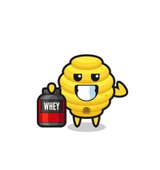 the muscular bee hive character is holding a protein supplement