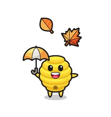cartoon of the cute bee hive holding an umbrella in autumn