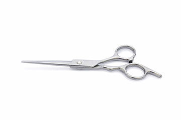 A silver hair cutting scissors with isolated on white background.