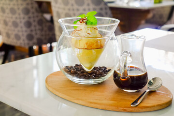 Affogato coffee with vanilla Ice Cream on table