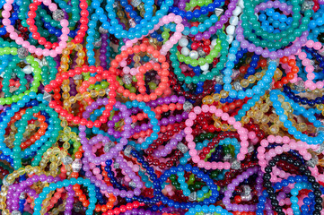Fototapeta na wymiar Colorful beads, colorful bracelets, colorful rosaries, natural stone