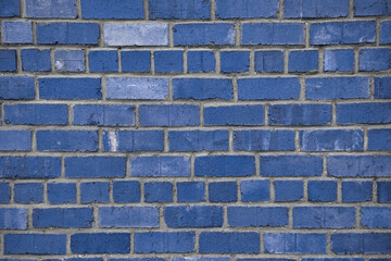 Blue brick wall texture. Blue painted horizontal part of brick wall textured surface.