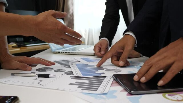 Business strategy investment concept office Teamwork with business people analysis cost graph