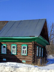 beautiful wooden house in the village in spring