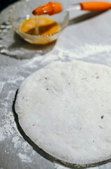 The process of making an Ossetian pie. Ossetian pie. Pie with cheese. National dish. National oriental dish. Caucasian cuisine. Asian cuisine.