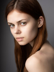 Obraz premium beautiful woman red hair naked shoulders posing Lifestyle Studio