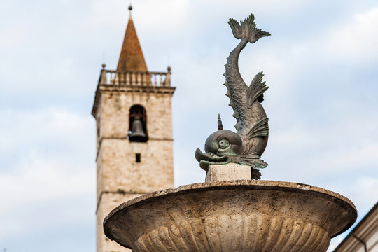 Fountain and Bell Tower in Historic Piazza Arringo, Ascoli Piceno, Italy