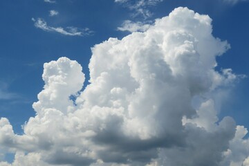 Big cumulus clouds in the blue sky, natural clouds background