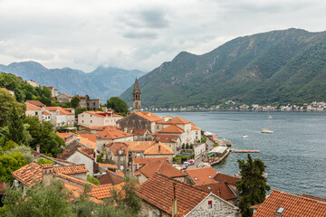 Naklejka na ściany i meble Panorama of medieval town Perast with orange tiled houses, Kotor Bay, Montenegro