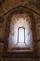 Backlit niche window in Castel del Monte (Italy)