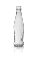 Empty glass bottle with a pattern, transparent without a lid. Isolated on a white background, with reflection.