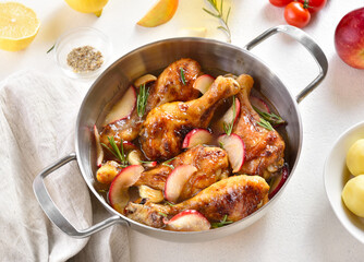 Chicken drumsticks baked with apples