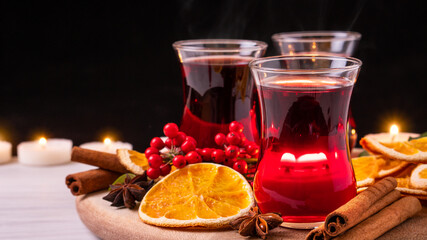 German tradition winter Christmas market new year holidays festival drink tea Gluhwein Mulled sweet hot warm red Wine with spices citrus aromatic cinnamon star anise