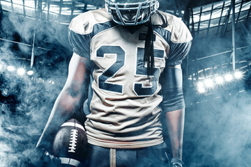 American football sportsman player on stadium with lights on background