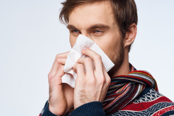emotional man with a handkerchief health problem flu symptoms isolated background