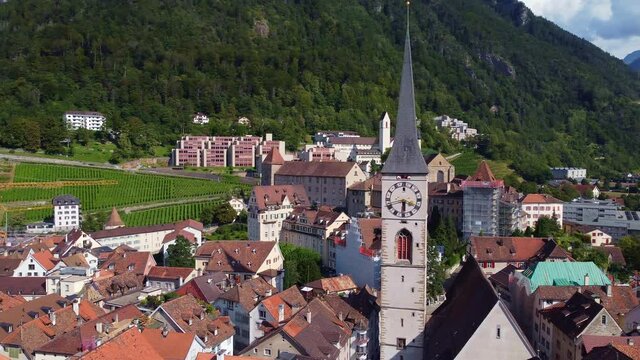 Aerial drone footage of the Chur old town in Canton Graubunden in the alps in Switzerland. Shot with a rotation motion