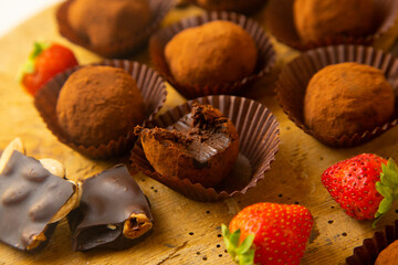 Premium dark chocolate truffles with strawberries