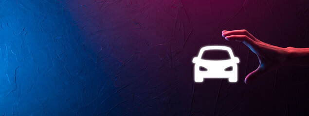 Male hand holding car auto icon on neon red,blue background. Wide banner composition.Car automobile insurance and collision damage waiver concepts
