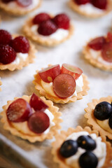 Fruit tarts with raspberries on a plate 