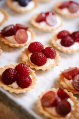 Fruit tarts with raspberries on a plate 