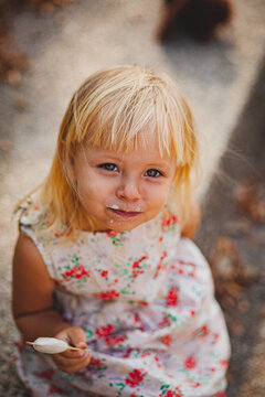 Portrait Of A Girl Who Got Dirty With Ice Cream