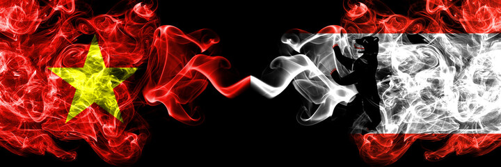 Vietnam, Vietnamese vs Germany, Berlin, city smoke flags side by side.